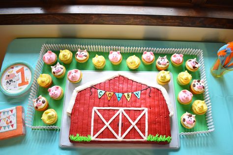 Farm birthday. Barnyard birthday. Farm animal cupcakes. Barn cake. Barnyard animal cupcakes. Farm Animal First Birthday Party Smash Cakes, Barn Cake With Animal Cupcakes, Barnyard Cupcakes Farm Theme, Barnyard Sheet Cake, Barnyard 1st Birthday Cake, Barnyard First Birthday Cake, Barnyard Animal Cake, Farm Theme Sheet Cake, One Year Old Farm Theme Birthday