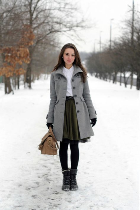 Winter skirt outfit inspiration for snowy days Winter Village Outfit, Skirt Snow Outfit, Snow Winter Dress, Snow Skirt Outfit, Modest Skirt Outfits Winter, Cold Weather Fantasy Outfits, Casual Gray Winter Skirt, Winter Skirt Outfit Snow, Snowy Outfits Winter