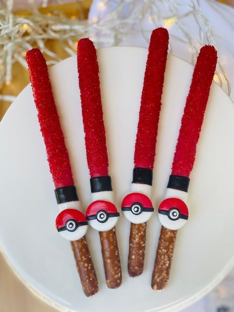 Pokeman Pokeball pretzels for your Pikachu theme birthday event. Hand dipped chocolate covered pretzel rods are individually wrapped with a curling ribbon and shipped with bubble wrap to help get to you with no breakages. Listing is sold by the 1/2 dozen or 1 dozen or convo me how many you may need. Pokemon Themed Party, Dessert Table Birthday, Chocolate Covered Pretzel Rods, Baby Shower Dessert Table, Birthday Chocolate, Birthday Party Desserts, Pokemon Birthday Party, Shower Desserts, Birthday Chocolates