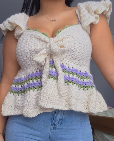 Hi! This is the pattern for my first original crochet design, the Tulip Top! This pattern is made to measure and can fit all sizes! IF you have any questions about this top, feel free to reach out to me on Instagram and TikTok @crochetjuless. Skill level: Advanced Beginner Terminology: US This purchase includes only a PDS file with a written pattern for the Tulip Top, NOT the physical piece.  Terms of Use: This pattern is strictly for personal uses only. The redistribution of this pattern in the form of PDF or video tutorial is strictly prohibited regardless of whether it is free or for sale. Crochet Top Ruffle, Trendy Crochet Tops, Crochet Babydoll Top, Tulip Top, Crochet Festival Top, Crochet Pour Halloween, Beau Crochet, Crochet Festival, Unique Tools