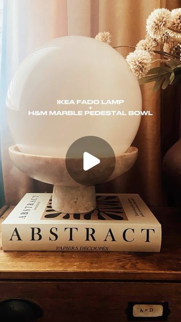 Pati-DIY & Home 🇬🇧🇵🇱 on Instagram: "(PL↴)🇬🇧When @ikea and @hmhome are the Beyoncé and Jay-Z of budget decor!
Presenting the Power Couple of the Century: the IKEA FADO Lamp and H&M’s Marble Pedestal Bowl—a match made in the aisles of minimalist heaven. One’s a spherical symbol of soft mood lighting, and the other is, well, a bowl that’s probably never held fruit because it’s too busy holding a glow-up. You know it’s true love when your lamp doesn’t sit on the pedestal; it’s elevated by it. And now, they’ve teamed up to give the phrase “outshine the competition” a literal meaning.

Forget star-crossed lovers—this is sphere-on-pedestal greatness! All for a combined price that might still let you afford the occasional avocado toast.

🇵🇱Gdy IKEA i H&M Home stają się Beyoncé i Jay-Z budż Fado Ikea, Ikea Fado Lamp, Fado Lamp, Ikea Fado, Marble Pedestal, Ikea Lamp, Budget Decor, Star Crossed Lovers, Pedestal Bowl