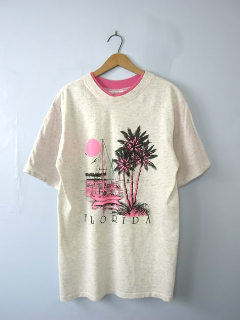 One vintage 1990's graphic tee, Florida sunset pink shirt, size large Florida Graphic Tee, Vintage Womens T Shirts, Trending Graphic Tees 2023, Vintage Tourist Shirt, 80s Graphic Tees Vintage, Old Graphic Tees, 90s T Shirts Graphic Tees, 80s Graphic Tees, Vintage Tshirt Design Graphics