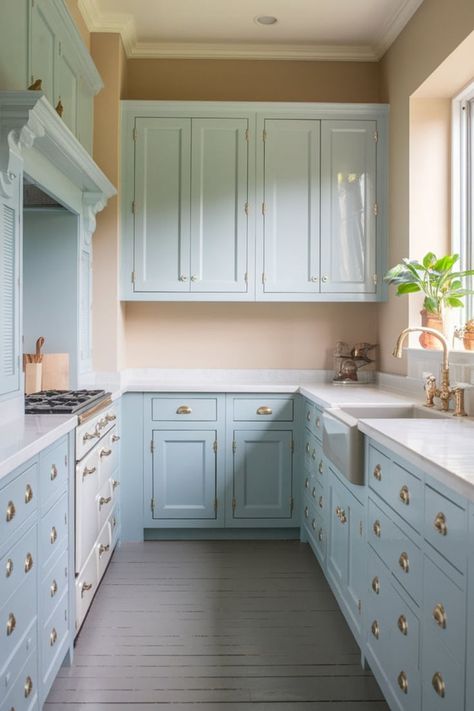 Mint green and white galley kitchen with gold hardware and white counter tops in the kitchen Mint Cabinets, Light Gray Countertops, Kitchen 2025, Cabinet Color Ideas, Galley Kitchen Layout, Kitchen Cabinet Color, Vibrant Kitchen, Inviting Kitchen, Light Blue Kitchens