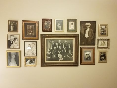 Family Portrait On Wall, Family Portraits Wall Display, Vintage Gallery Wall Family Photos, Black And White Family Picture Wall, Black And White Family Picture Gallery Wall, Family History Wall, Vintage Family Photos Wall, Old Family Photos Display, Family Picture Wall Black Frames