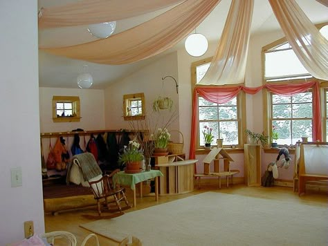 Love This -- Love The Fabric Hanging On The Ceiling & The Color Of The Curtains... The Rocking Chair For Reading Aloud Time... The Plants -- Perfect :) Waldorf Kindergarten Classroom, Classroom Colors, Classroom Ceiling, Teaching Preschoolers, Waldorf Kindergarten, Steiner Waldorf, Reggio Classroom, Waldorf School, Waldorf Education