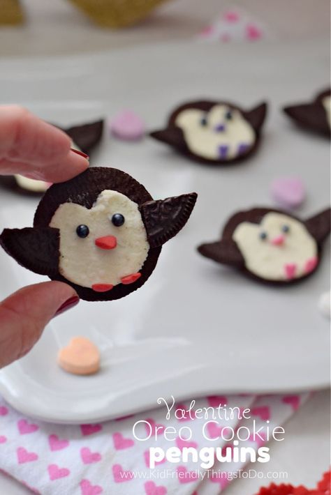 This Penguin Valentine Oreo Cookie is so adorable and so easy to make. Make them as fun treats for the kids, or let the kids join in on the fun of creating these cute Valentine's Day Treats. www.kidfriendlythingstodo.com Valentines Marshmallow Pops, Chocolate Haystacks, Penguin Cookies, Mason Jar Desserts, Valentine's Day Treats, Decadent Chocolate Desserts, Chocolate Covered Marshmallows, Chocolate Whipped Cream, Ice Cream Floats