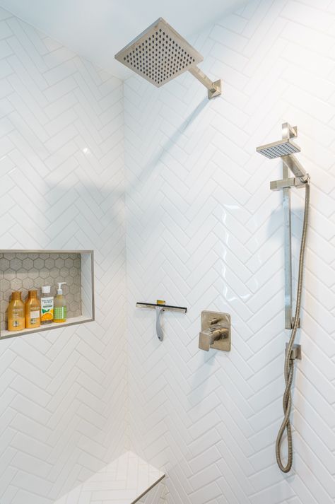 Small Bathroom Two Shower Heads, Herringbone Shower Tub Combo, Herringbone Shower Tile With Niche, White Herringbone Tile Shower Wall, Bathroom Shower Tile Ideas Walk In Herringbone Pattern, Herringbone Tile Bathroom Shower Wall, Large Herringbone Shower Tile, White Herringbone Tile Bathroom Wall, Herringbone Subway Tile Shower Wall