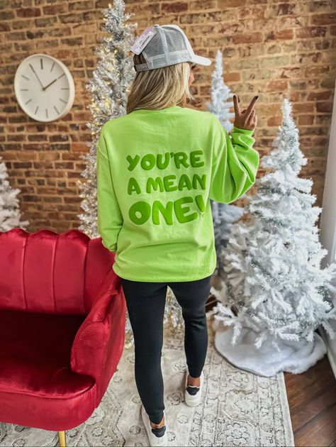 You’re a Mean One Puff Sweatshirt Comes in lime green or hot pink Sizes: S-3XL TAT: 2-3 business days Christmas Vinyl Sweatshirts, Sweatshirt Design Ideas Vinyl, Holiday Tshirt Designs, Vinyl Sweatshirt Ideas Cricut, Grinch Sweatshirt Ideas, Puff Vinyl Shirts, Bartending Shirts, Puff Vinyl Sweatshirt, Vinyl Sweatshirt Ideas