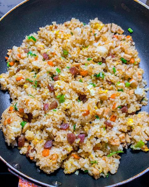 Dive into the vibrant flavors of Vietnamese cuisine with this top Com Chien recipe from Yelo HTX. Perfectly seasoned and packed with a delightful mix of textures, this fried rice dish is a must-try for food lovers. Whether you're a seasoned chef or a kitchen newbie, this recipe offers a simple yet delicious way to bring a taste of Vietnam to your table. Enjoy the aromatic blend of spices and fresh ingredients that make this dish a standout favorite. Lemongrass Fried Rice, Vietnamese Fried Rice Recipe, Cajun Fried Rice, Vietnamese Fried Rice, Thai Fried Rice, Vietnamese Rice, Veggie Fried Rice, Fried Rice Recipe Easy, Garlic Fried Rice