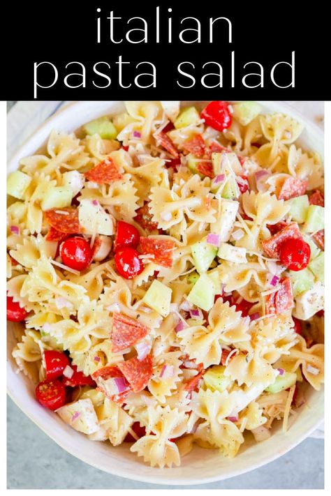 Italian Pasta Salad is an easy pasta salad recipe made with bowtie pasta, pepperoni, cucumber, tomatoes, onions, mozzarella and parmesan cheese, and Italian dressing. This is perfect for a summer picnic or BBQ side dish! Pasta Pepperoni, Italian Dressing Pasta Salad, Bowtie Pasta Salad, Crockpot Side Dishes, Classic Macaroni Salad, Classic Pasta Salad, Salad Cucumber, Italian Pasta Salad, Italian Cuisine Recipe