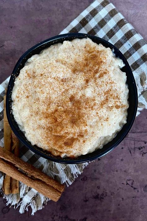 Indulge in the rich and creamy goodness of rice pudding with sweetened condensed milk. This easy-to-follow recipe guarantees a delicious and satisfying dessert recipe. #grumpyshoneybunch #rice #pudding #vanilla #sweetenedcondensedmilk Almond Milk Rice Pudding, Milk Rice Pudding, Creamiest Rice Pudding Recipe, Baked Rice Pudding, Creamy Rice Pudding, Milk Rice, Baked Rice, Creamy Rice, Homemade Almond Milk