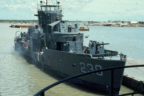 RVNS Nguyen Ngoc Long,HQ-230, formerly USS LCS(L)(3)-96, moored pierside at Dong Tam, South Vietnam, 21 May 1971. We used to call this the "brown water Navy" back in the day. United States Navy Ships, Brown Water Navy, Brown Water, Vietnam History, Military Gear Tactical, South Vietnam, Boat Art, Military Diorama, Military Photos