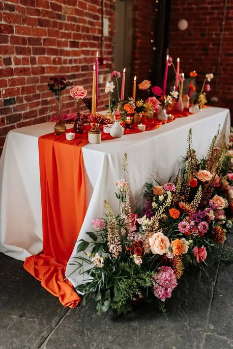 We guarantee you've never seen such a groovy, retro editorial shoot like this one in Northern Monk Refectory Leeds, with streamers galore! Retro Editorial, Orange Table Runner, Orange Wedding Decorations, Flower Centrepieces, Retro Wedding Decorations, Orange Wedding Themes, Orange And Pink Wedding, Orange Wedding Flowers, Burnt Orange Weddings