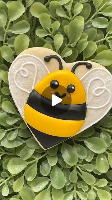 Brandi Garcia on Instagram: "Happy Flippin’ Friday! It’s the day of the week when I share a cookie cutter “flip” by decorating a cookie as something other than the cutter was intended.

This week, a heart into a bee ❤️➡️🐝 I hope your weekend is sweet as can be!

#cookies #flipthatcutter #cookiedecorating #sanantoniocookier #flippinfriday" Firefly Cookies Decorated, Bee Sugar Cookies Decorated, Bee Cookies Royal Icing, Bumble Bee Cookies Decorated, Bees Cookies, Bee Biscuits, Bee Cookies Decorated, Summer Cookies Decorated, Bumble Bee Cookies