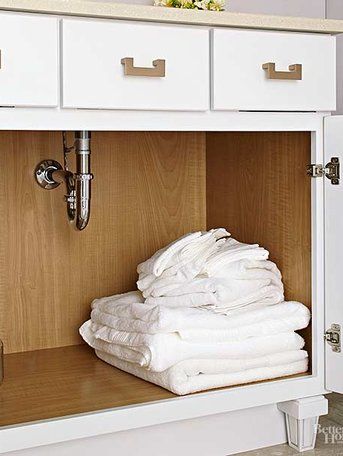 under sink storage Towels Under Bathroom Sink, Under Sink Storage Bathroom, Under Bathroom Sink Storage, Common Bathroom, Bathroom Sink Cabinet, Under Bathroom Sink, Small Bathroom Cabinets, Bathroom Under Sink, Bathroom Sink Organization