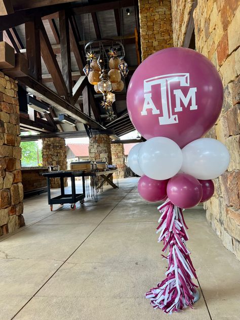 Senior Serve Table Ideas, College Balloons, Balloon Centerpiece Ideas, Senior Tables, Aggie Graduation Party, Nike Party, Ring Dunk, Seniors 2024, Graduation Party Pictures