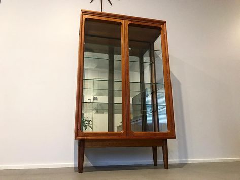 Mid Century Lane on Instagram: “✨SOLD✨ Maggie, Rouse Hill NSW✨ Beautiful Australian made Chiswell 1970’s teak display cabinet with tempered glass shelves and cigar legs.…” Mid Century Modern Curio Cabinet, Display Cabinet Mid Century, Midcentury Glass Cabinet, Walnut Curio Cabinet, Brass Shelf, Salerno Glass Door Cabinet, Brass Shelves, Second Hand Furniture, Tempered Glass Shelves