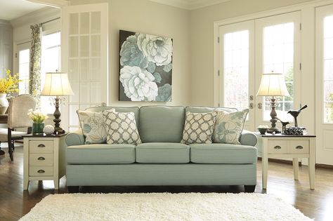 Seafoam green sofa in a white room with matching coastal decor. Sofa Bar, Queen Sofa Sleeper, Green Sofa, Ashley Furniture Homestore, Living Room Green, Coaster Furniture, A Living Room, Ashley Furniture, Room Colors