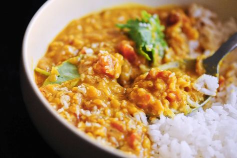 Cozy up with this quick, easy, & tasty one pot spicy coconut red lentil dahl that is made with red lentils, coconut milk, tomatoes, garlic, onion and the perfect blend of Indian spices. It makes a most delicious gluten-free, vegan dish served alongside some basmati rice or naan bread! You can make this easy dal in the Instant Pot pressure cooker or on the stovetop!#dal #coconutdal #spicydal #daal #dahl #dalrecipe #indiandal #vegandal | Spicy Dal Recipe | Coconut Dal | Indian Dal | Dal Recipe Red Lentil Dahl Recipe, Coconut Dal, Dahl Recipe, Lentil Dahl, Chickpea Coconut Curry, Lentil Dal, Healthy Indian Recipes, Red Lentils, Dal Recipe