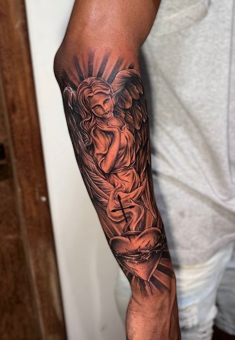 Archangel Michael Tattoo For Men Forearm, Arm Tattoo Black Man, Angel Forearm Tattoo Men, Men Sleeve Tattoo Ideas Unique, Jesus Piece Tattoo, Jesus Sleeve Tattoo, Angel Tattoo Sleeve, Hand Sleeve Tattoo, Back Forearm Tattoo Men