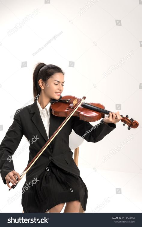 In violin practice class,beautiful asia woman hold wooden violin.learn and practice playing violin together to prepare for the concert.Education concept. #Ad , #Affiliate, #asia#woman#hold#beautiful Person Holding Violin, Holding Violin Pose Drawing, Person Playing Violin Reference, Person Playing Violin, Violin Practice, Base Ideas, Playing Violin, Violin Bow, Pose References