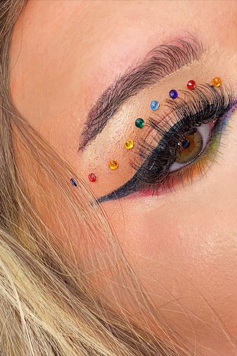 Face Gem Ideas Festival, Rainbow Gemstone Makeup, Colourful Rhinestone Makeup, Pride Gems On Face, Colorful Gem Makeup, Pride Face Gems, Pride Fest Makeup, Rainbow Gem Makeup, Pride Rhinestone Makeup