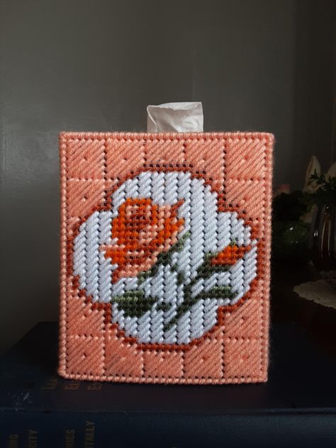 Handmade needlepoint tissue box cover. An elegant peach rose adorns the front of the box and a block pattern decorates the other three sides.  Fits a boutique size tissue box. This item makes a beautiful gift. Made in a smoke free environment and ready to ship!  **This is a finished product ** Plastic Canvas Tissue Box Patterns Free, Tissue Box Crafts, Plastic Canvas Box Patterns, Canvas Coasters, Canvas Picture Frames, Kleenex Box Cover, Box Crafts, Box Templates, Plastic Canvas Coasters