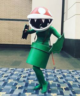 Cosplay in America - I came up with the idea of Pirahna Plant when my fiance and I wanted to do a Super Smash Bros Ultimate group with our friends for Otakon! We wanted to do odd characters so he chose Olimar, and I chose Piranha Plant. I liked the idea of challenging myself on how to make myself into this iconic plant haha  I used EVA foam to make the head, leaves, and pipe, and worked on it off and on for about 3 months. The green outfit I wore was just constructed by items I found on Amazon, but I'm really proud of how simple but effective my costume became.   I started cosplaying 9 years ago, and I can't imagine my life without it. Cosplay has shown me what it's really like to belong to a community, and I couldn't be more thankful.I've met so many amazing people, it's how I met the lov Super Smash Bros Cosplay, Piranha Plant Costume, It Cosplay, Piranha Plant, Mario Bros., Green Outfit, Cosplay Ideas, Amazing People, Super Smash Bros