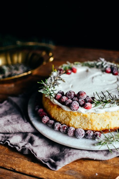 white chocolate cheesecake (with sugared rosemary & cranberries) — the farmer's daughter | let's bake something Sugared Rosemary, Making Cheesecake, Holiday Cheesecake, Mocha Cheesecake, Cranberry Cheesecake, Christmas Cheesecake, Bake Something, White Chocolate Cheesecake, Holiday Sweets