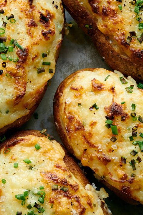 Twice-Baked Potatoes Recipe - NYT Cooking Cheesy Twice Baked Potatoes, Creamy Twice Baked Potatoes, What To Do With Baked Potatoes, Charred Scallions, Nytimes Cooking, Christmas Dinner Side Dishes, Dinner Side Dish Recipes, Christmas Dinner Sides, Small Thanksgiving