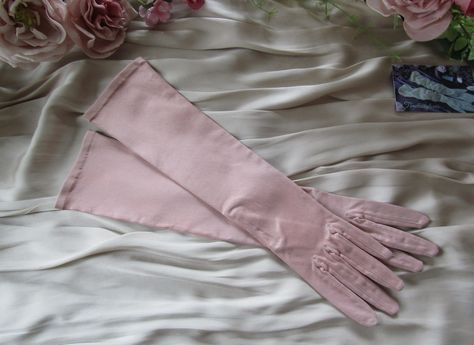 Vintage dusty pink Neyret mid length gloves. Size 7 Made in France These fabulous gloves are in good used condition.   If you are not sure about your glove size, measure the hand you normally write with at its widest point in inches (excluding the thumb), then round down to the nearest half or whole number - this will be your glove size. For example, if your hand measures 8½ inches around its widest point (excluding the thumb), your glove size is 8½. Formal Gloves, Mitten Gloves, Dusty Pink, The Hand, Mid Length, Custom Clothes, Made In France, Gloves, Bathing Beauties