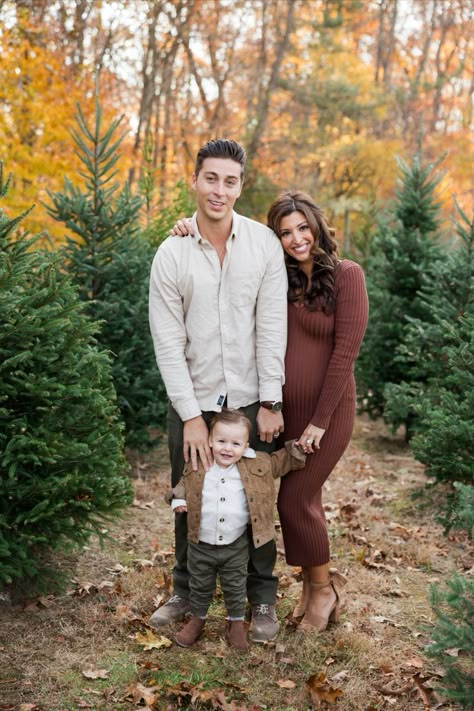 Fall inspired family photos at a Christmas Tree Farm Fall Family Photos Tree Farm, Tree Farm Pictures Family, Outdoor Family Photos Christmas, Christmas Photos At Tree Farm, Christmas Tree Farm Photo Shoot Family Mini Sessions Outfits, Christmas Farm Maternity Pictures, Snow Canyon Family Pictures, Mountain Family Photos Outfit, Family Photos At Tree Farm