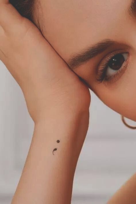 Selena Gomez Tattoo Semi Colon, Semi-colon Tattoo Quotes, Semi-colon Tattoo Placement Ideas, Semi Colon Tattoo Wrist, Simple Semicolon Tattoo, Ollie Tattoo, Mental Health Tatoos Design, Semicolon Tattoo Placement, A Name Tattoo