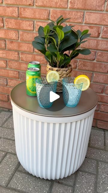 Home decor by Ro on Instagram: "Viral outdoor storage hack/ side table that I had to give a try! For just $35 from Walmart 🙌💛 
❤️Like and Follow @homedecor_by_ro 
What you need 👇
large 16” planter 
16” pizza pan 
Spray paint (optional)
To give it a complete luxe look I spray painted the pan with a light gold color. 
Tip: make sure to add a sealer, the paint can scratch off easily on the non-stick pan 💛
.
.
.
.
.
.
.
.
.
.
.
#outdoordecor #patiodecor #homedecor #springtime #viralhack #sidetable #storagebin #planter #walmartfinds #walmartdecor #athome #walmart 

Inspired by @thecraftedstudioco 💕" Ikea Planters, Poppy Craft For Kids, Walmart Decor, Handmade Journals Diy, Wine Cork Art, Diy Outdoor Table, Diy Side Table, Patio Side Table, Succulent Garden Diy