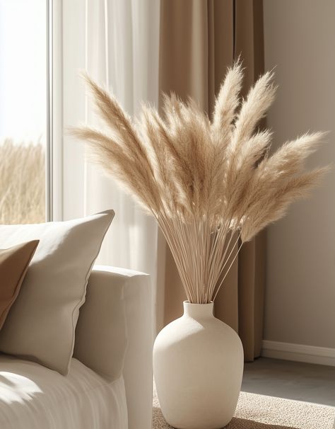 Elevate your space with this stunning white vase filled with pampas! Perfect for infusing your home with laid-back, rustic charm and Insta-worthy style, it's all about those organic vibes that make any room feel warm and inviting. Whether you're styling your living room or adding a touch of nature to your decor, this piece brings an effortlessly chic boho twist to your space. 🚀🏡 #RusticDecor #PampasVibes #CozyHome #BohoChic #InteriorDesign #HomeInspo #DecorGoals White Vase With Pampas, Vase With Pampas, Boho Twists, White Vase, Home Vibes, White Vases, Rustic Elegance, Cozy Home, Effortlessly Chic