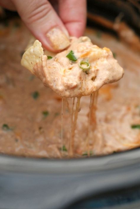 This recipe for the World's Best Easy Cheesy Bean Dip is cooked in your crock pot and made with three kinds of cheese, green chilies, and Mexican spices.  Everyone will want the recipe! Crock Pot Vegetarian, Cheesy Bean Dip, Cheese Dip Crock Pot, Bean Dip Recipes, Crock Pot Dips, Mexican Appetizers, Food Appetizers, Vegetarian Crockpot, Superbowl Party Food