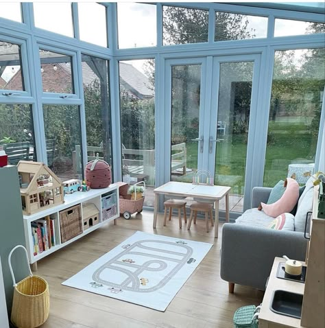 Four Seasons Playroom, Sunroom Playroom Ideas Cozy, Conservatory Toy Room Ideas, Playroom In Conservatory, Florida Room Playroom, Toy Room Conservatory, Small Conservatory Playroom Ideas, Kids Playroom Ideas Sunroom, Playroom Extension Ideas