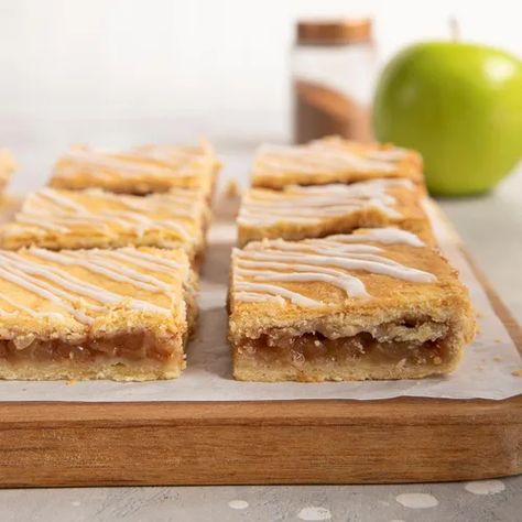 Glazed Apple Pie Bars Recipe: How to Make It Apple Pie Glaze Recipe, Taste Of Home Apple Bars, Glazed Apple Pie Bars, Apple Bars With Maple Glaze, Pie Glaze Recipe, Apple Slab Bars, Pie Glaze, Apple Pie With Gala Apples Recipe, Apple Pie Bars Recipe