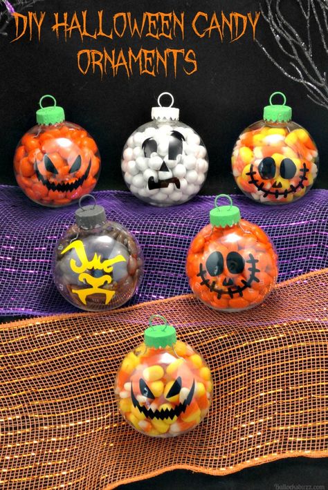 These cute DIY Halloween Candy Ornaments work great as decor, party favors or treats! Click thru to see how to make them. Halloween Ornaments Diy, Diy Halloween Candy, Halloween Tree Decorations, Candy Ornaments, Halloween Favors, Candy Decorations, Diy Ornaments, Halloween Party Diy, Halloween Diy Crafts