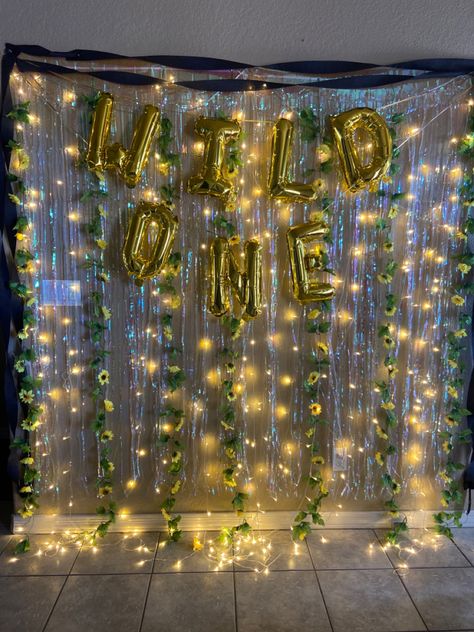 Photo taking area for pur wild ones first birthday party. Lights. Sunflowers. Wild one #wildone #sunflower #birthdayparty #cheetahwildone Wild One First Birthday, Photo Area, First Birthday Photo, Wild One Birthday Party, First Birthday Photos, Back Drop, One Photo, Party Lights, First Birthday Party