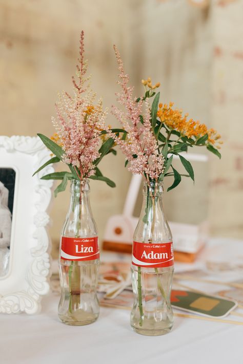 Name Coke Bottle Flower Floral Personalised Left Bank Leeds Wedding Amber Marie Photography #Name #Coke #Bottle #WeddingFlowers #Floral #Personalised #Wedding Coke Bottle Decorations Ideas, Crafts With Coke Bottles, Flowers In Coke Bottles, Coke Bottle Centerpiece, Coke Bottle Flowers, Coke Bottle Decor, Flower In Bottle, Coca Cola Wedding, Coke Bottle Crafts