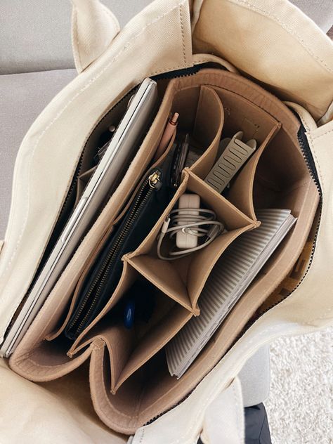 if you have a tote bag you NEED this tote organizer !! Comes in so many different sizes & is so nice to keep everything organized!! #organizing #totebag #salealert Follow my shop @maddyytrueman on the @shop.LTK app to shop this post and get my exclusive app-only content! #liketkit #LTKitbag #LTKU #LTKunder50 @shop.ltk https://liketk.it/3Qz8G Organized Bags And Purses, School Bag Organizer, Everything Tote Bag, Make Up Bag Organizer, University School Bag, Office Bag Organization, Whats In My Marc Jacobs Tote Bag, Bag In Bag Organizing, Organized Work Bag