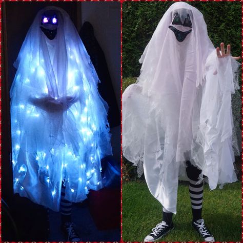 Anyone else anxiously waiting for Halloween?! Check out this ghost costume I made for my kid out of fabric from my stash and led lights! It's easy to make, just takes a little time. Mens Ghost Costume, Diy Light Up Halloween Costumes, Creative Ghost Costume, Glowing Ghost Costume, Diy Sheet Ghost Costume, Bedsheet Ghost Costume, Tulle Ghost Costume, Ghost Themed Trunk Or Treat, Homemade Ghost Costume