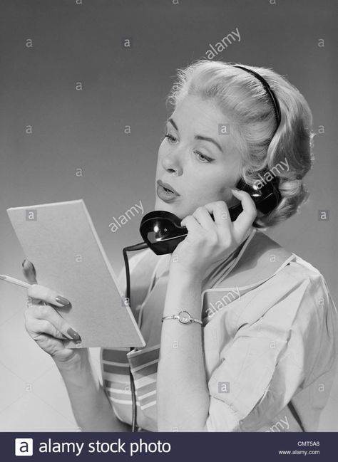 1950s 1960s BLOND WOMAN TALKING ON TELEPHONE READING LIST Stock Photo Answering Phone Pose, Woman Looking At Phone, Holding Telephone Reference, Telephone Pose, On Phone Pose Reference, Telephone Photography, Character Brainstorm, Holding Telephone, Women Reference