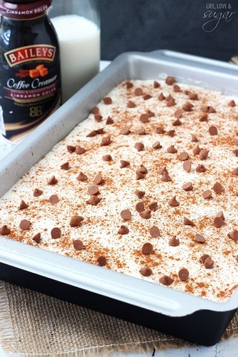 I'm completely in love with this Cinnamon Roll Poke Cake. This incredible cinnamon roll cake is soaked with an amazing buttery cinnamon mixture and topped with vanilla icing! It's to die for! #cinnamon #cinnamonroll #pokecake #cinnamoncake #cinnamonrollpokecake #cinnamonpokecake #cinnamonrollrecipe #pokecakerecipe Cinnamon Roll Poke Cake, Cinnamon Roll Pound Cake, Cinnamon Cake Recipes, Dog Fundraiser, Life Love And Sugar, Cinnamon Roll Monkey Bread, Cinnamon Roll Cheesecake, Icing Recipes, Moist Vanilla Cake