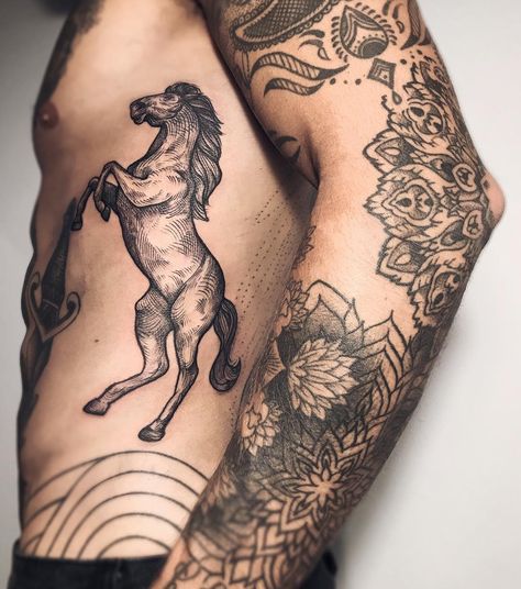 by lesyale_ #tattoo #horse #body #hand #pattern Men’s Horse Tattoo, Stallion Horse Tattoo, Back Horse Tattoo, Masculine Horse Tattoo, Roman Horse Tattoo, Horse Tattoos Men, Woodcut Horse Tattoo, Wild Horse Tattoo Design, Horse Arm Tattoo