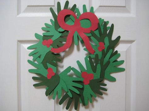 handprint wreath - Google Search Couronne Diy, Classroom Christmas Decorations, Jul Diy, Christmas Wreath Craft, Handprint Christmas, Cute Christmas Decorations, Preschool Christmas Crafts, Christmas Crafts For Kids To Make, Holiday Crafts For Kids