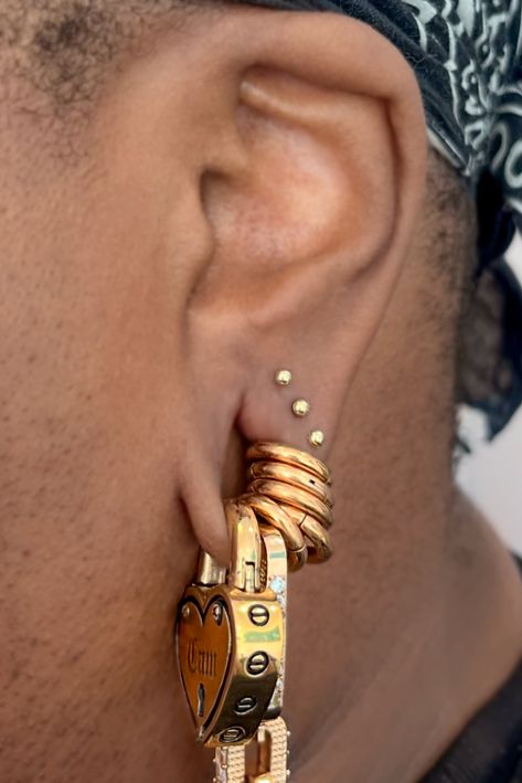 Triple lobe for Cam, featuring some stunning weights from @mayajewelry.   Done at @sogoldbk"  — @cassisoclassy (all on IG)  Cam wears custom engraved Forever Yours weights and Chain Reaction all in Yellow Gold.  Shop Ear Weights in the Link Below: Stretched Ear Curation, Ear Weights Stretched, Stretchers Ear Piercings, Double Snug Piercing, Aries Constellation Piercing, Small Stretched Ears Aesthetic, Ear Piercings With Gauges, Ear Gauges Aesthetic, Small Stretched Ears