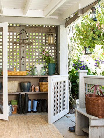 Garden Station: Don't forget about the transition between your home and garden. This partially enclosed space ensures that dirt, mud, boots, and gardening gear don't block a side entry or create a mess inside the house. A solid roof offers protection for the elements while a lattice peg wall and concrete make storage and cleaning a breeze. Outdoor Mudroom, Diy Potting Shed, Diy Pedestal, Garden Station, Lattice Wall, Potting Benches, Shed Interior, Gardening Gear, Enclosed Patio