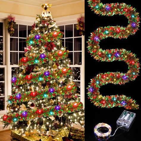 PRICES MAY VARY. Christmas Tinsel Garland: you will receive 1 piece metallic Christmas tree garland and 1 piece LED lights string, long enough to decorate your Christmas tree, adding festive atmosphere for your home; The metallic shiny colors and bright lights make your Christmas party more attractive and memorable Tinsel Garland Size: the tinsel garland is approx. 39.4 feet/ 12 meters in length, and 9 cm/ 3.5 inches in width; And the LED lights string measures approx. 39.4 feet/ 12 meters in le Christmas Lights Garland Outside, Vertical Garland On Christmas Tree, Christmas Tree Themes Colors Wreaths & Garlandschristmas Tree Themes, You Tube How Wrap Xmas Lights On Garland, Thick And Full Garland For Tree, Christmas Tinsel Garland Tree, Outdoor Garland Michaels Stores, Chriatmas Tree With Tinsel Garland, Garland Christmas With Lights